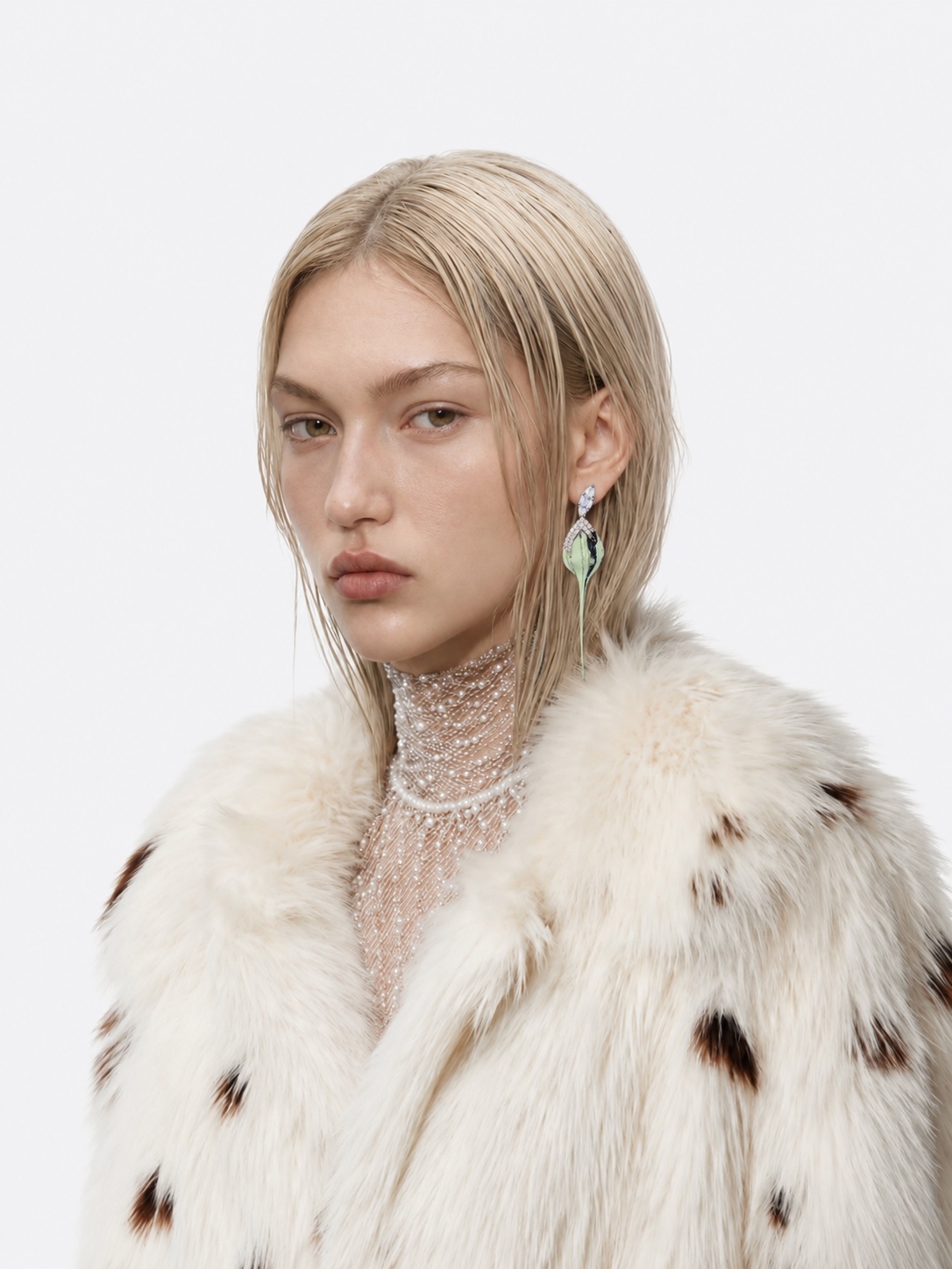 Model wearing ARYUTKINA earrings
